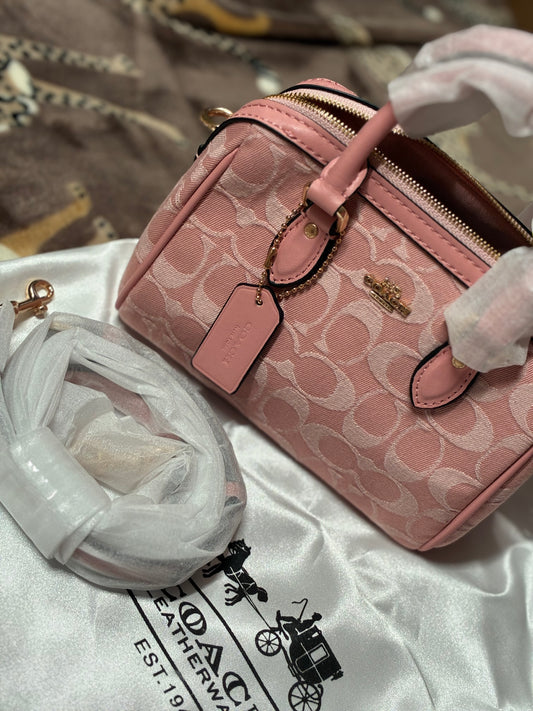 Coach Mini Rowan Crossbody Bag in Signature Canvas – Powder Pink